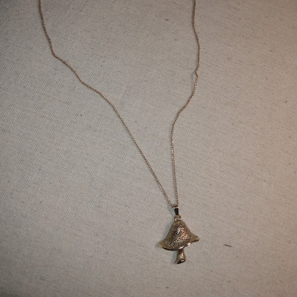 Marked Sarah: Gold Tone Mushroom Pendant Necklace.